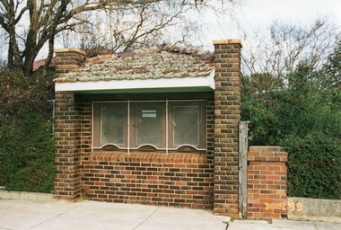 Photograph, Brick Ticket Box at Central Park  c 1937 -- Coloured