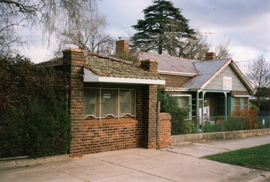 Photograph, Brick Ticket Box at Central Park next to the former Dane House -- Coloured