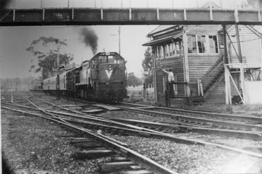 Photograph, Signal Box with a train coming into the station