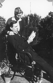 Photograph, Mr Colin Campbell Heron reclining in chair