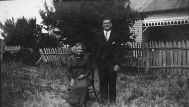 Photograph, Mr Stan Harris & Mrs Harris nee Unknown beside their weatherboard cottage