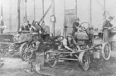 Photograph, Wimmera Motor Cycles Garage Workshop with men working