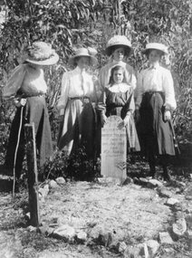 Photograph, Childs Grave with Wooden Marker and Five young Ladies -- Possibly the Folkes Sisters