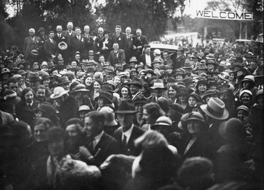 Photograph, "Home to Stawell" with a crowd at the Railway Station October 1935