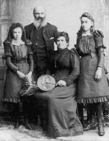 Photograph, Mr Josiah Emmerton & Mrs Caroline Emmerton nee Unknown with daughters Ethelwyne and Ruby Mildred -- Studio Portrait c1888 or 1889