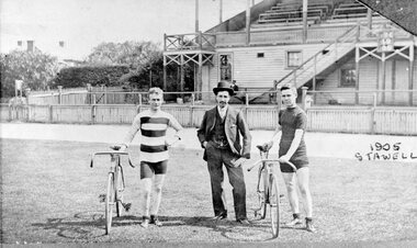Photograph, Three males, two with bicycles on the Stawell Central Park Oval 1905