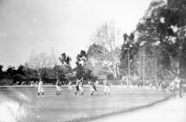 Photograph, Football match at the Stawell Central Park Oval c1920 showing the Goal posts and crowd