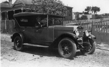 Photograph, Mr John Monaghan in a car c1920's