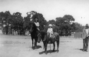 Photograph, Miss Margaret Monaghan & Mr Kevin Monaghan on horse with their father Kevin standing to side