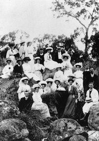 Photograph, Unknown persons in a bushland setting with people seated on boulders c1900's