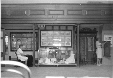 Photograph, Pleasant Creek Court House with Stawell Histotical Society member Betty Collins seated with Stawell Historical Society Past President Margaret Mason satnding