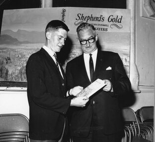 Photograph, Shepherd’s Gold Book launching with its Jacket design by Mr Vane Lindesay from an oil painting by Mr John Glover 1966