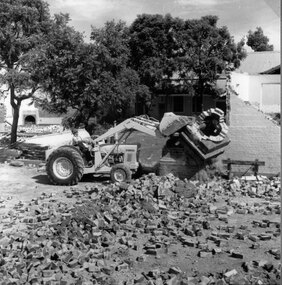 Photograph, Stawell Technical School finishing the Chimney demolition with a front end loader