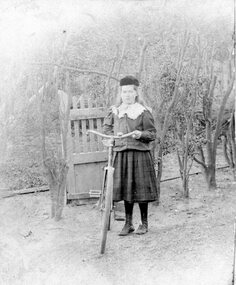 Photograph, Miss Tottie Telford with a Bicycle
