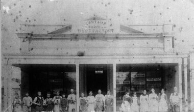 Photograph, Mr W. Laxton's Boot Factory with workers lined up on verandah in Main Street Stawell