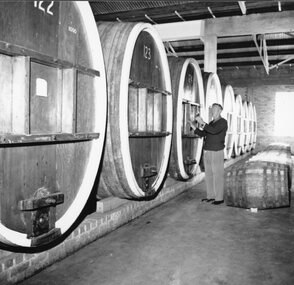 Photograph, Seppelts Storage Area in Great Western  with worker is Mr Leo Hurley