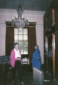 Photograph, Ledcourt Homestead interior with ladies  -- Mrs Eileen Cooper nee Unknown and possibly Mrs Ethel Cooper nee Unknown -- Colored