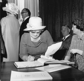 Photograph, Stawell Town Council Centenary with Mrs Dorothy Giles nee Unknown signing the Visitors Book 1970