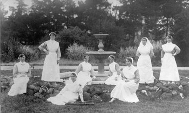 Photograph, Stawell Pleasant Creek Hospital with Nurses grouped around the fountain c1915