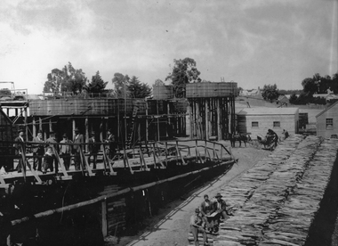 Photograph, Magdala Mine with woodstacks c1895
