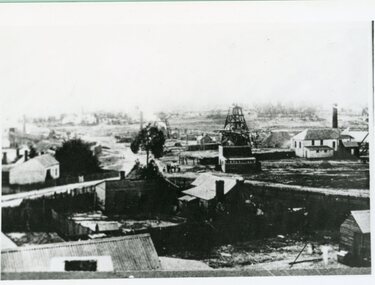 Photograph, Double story building on left is Lamont Crushing Battery & on the right is the Oriental Mine looking from the top of the Fire Station c1880's