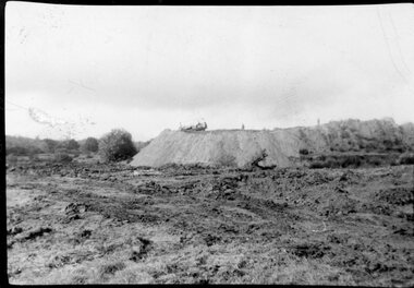 Photograph, Mr French on a Grader on top of a Soil Heap -- Possibly in Great Western
