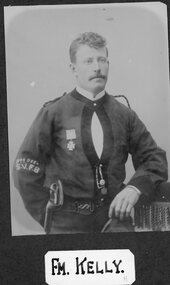 Photograph, Stawell Fire Brigade's Fireman Kelly 1885 -- Studio Portrait
