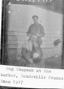 Photograph, Soldier Reg Chapman at the barbers in Doudeville France -- Christmas 1917