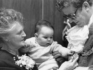 Photograph, Cr R Stone with his wife Shirley & perhaps their grandchild