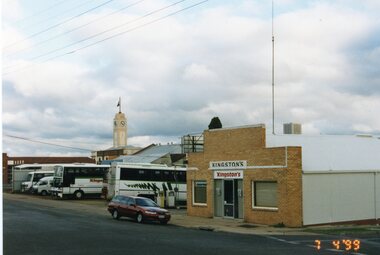 Photograph, Kingston's Bus Service building and Buses -- Coloured