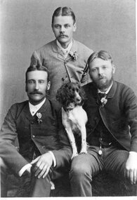Photograph, Mr Frank Harris, standing, Mr Alfred James Harris with the dog and Mr John Harris -- Studio Portrait