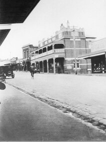 Photograph, Bull & Mouth Hotel in Main Street Stawell looking East with Dane's market on right c1920