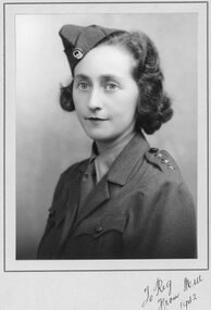 Photograph, Mrs Millicent Mason nee Theos in her Aust Women's League uniform 1942