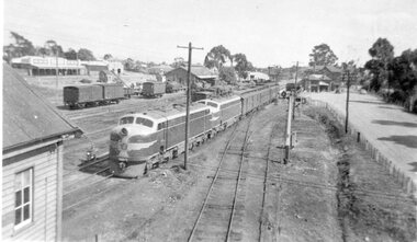 Photograph, Stawell Railway Yards with Two Diesel locomotives, the Station on right & the Signal Box in foreground c1950-1960's