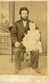 Photograph, Mr Richard Morcom Goldsworthy with 1 of his children -- Studio Portrait