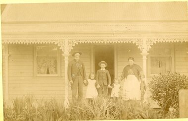 Photograph, Mrs Sarah Eliza Goldsworthy nee Unknown with her family in front of their home in Skene Street Stawell