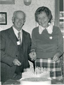 Photograph, Grange Golf Club Stawell Members Celebrating 50th anniversary by cutting cake 1986