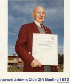 Photograph, Mr Reg Chapman - Stawell Athletic Club Life Member &  twice president holding certificate of appreciation on his 90th Birthday 1983