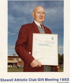 Photograph, Mr Reg Chapman - Stawell Athletic Club Life Member &  twice president holding certificate of appreciation on his 90th Birthday 1983