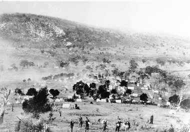 Photograph, Mafeking Goldfield at Mt William with men in foreground c1900