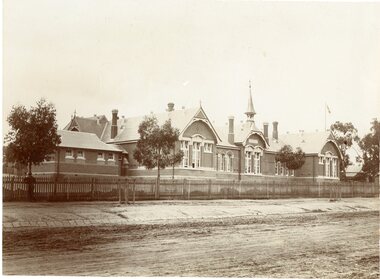 Photograph, Stawell Primary School Number 502 showing the Front of Building, Bell Tower & Bluestone pitchers for the Road Kerbing
