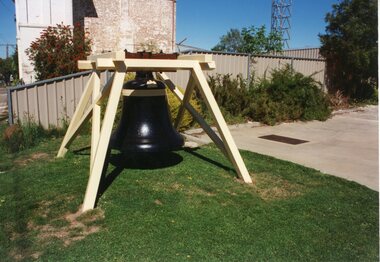 Photograph, Stawell Fire Brigade Bell --“The Lady of Stawell” hanging in frame -- Coloured