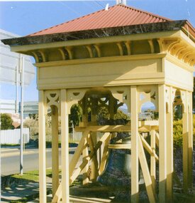 Photograph, Stawell Fire Brigade Bell (“The Lady of Stawell”) hanging in frame and with housing