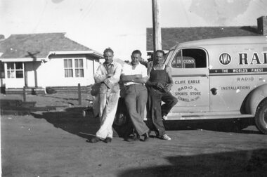 Photograph, Three men beside Mr Cliff Earle's Radio and Electrical Contractor vehicle 1949