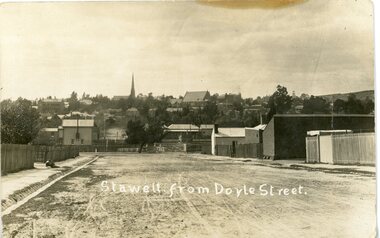 Photograph, Railway Signal Box at the left with Two churches in the background -- Postcard
