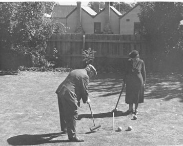 Photograph, Mr John Bennett & Mrs Bennett nee Unknown playing Croquet