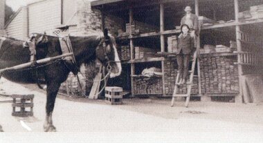 Photograph, Mr T Barker -- Tank Maker and Timber Merchant with Mr Alf Pickering, Mr Norm Gray & Bonny the horse at the Softwood Timber rack 1926