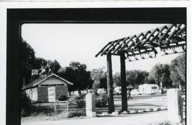 Photograph, Grampians Gate Caravan Park -- Park entrance with toilet block c1960