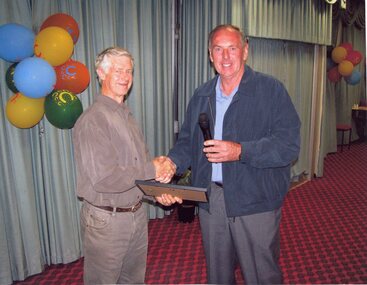 Photograph, Mr John Simpkin receiving Life Membership Certificate from Show President Geoff Erwin -- Coloured
