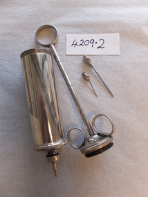 Archive, Large metal Syringe used by pharmacist - Pleasant Creek Training Centre